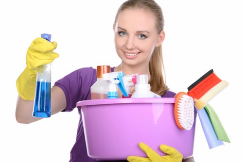 Technician handling carpet cleaning machine with care